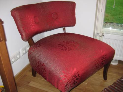 Mom's 60 year-old chair re-upholstered early 2009. It was lime green before.